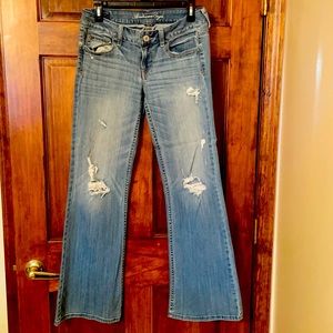 Size 4- medium blue, bell bottom, distressed jeans.